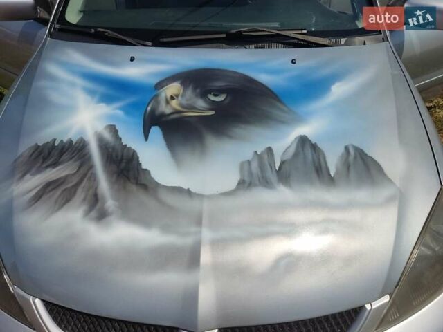 Серый Мицубиси Лансер, объемом двигателя 1.6 л и пробегом 212 тыс. км за 4450 $, фото 1 на Automoto.ua