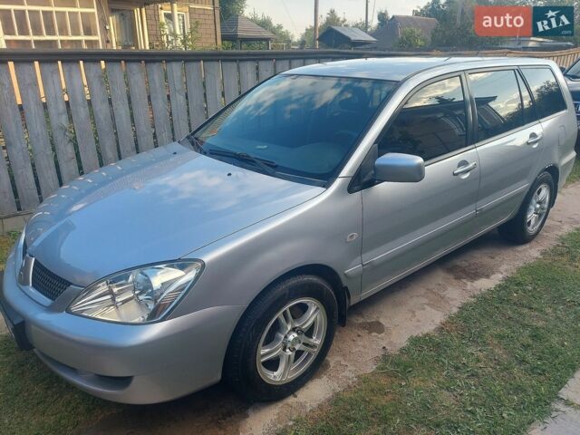 Сірий Міцубісі Lancer, об'ємом двигуна 1.58 л та пробігом 242 тис. км за 3900 $, фото 1 на Automoto.ua
