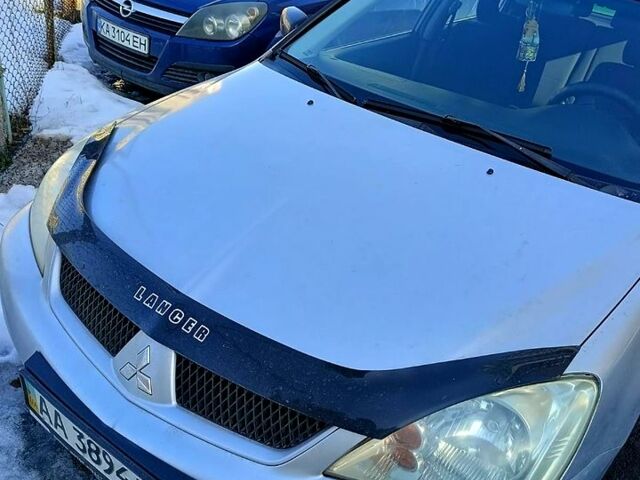 Сірий Міцубісі Lancer, об'ємом двигуна 1.6 л та пробігом 198 тис. км за 4100 $, фото 1 на Automoto.ua