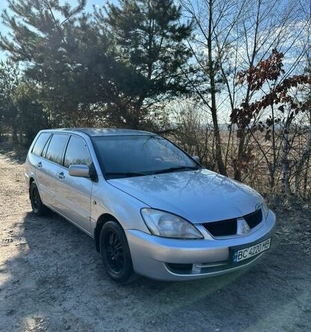 Сірий Міцубісі Lancer, об'ємом двигуна 1.58 л та пробігом 330 тис. км за 1800 $, фото 1 на Automoto.ua