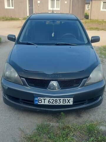 Сірий Міцубісі Lancer, об'ємом двигуна 2 л та пробігом 200 тис. км за 4000 $, фото 1 на Automoto.ua