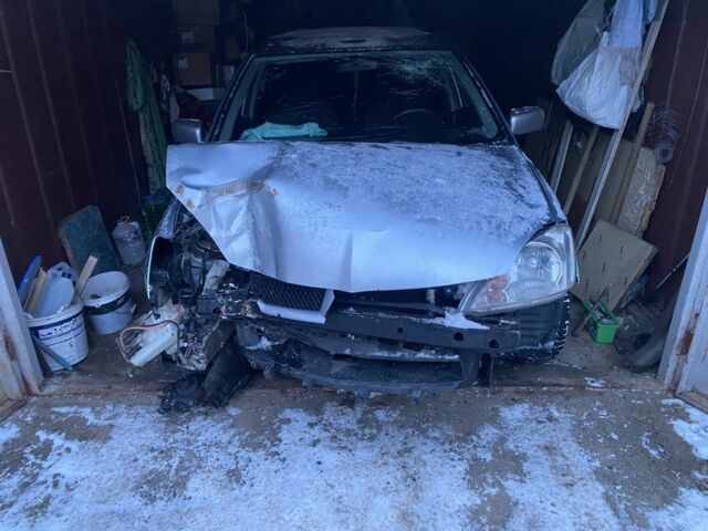 Серый Мицубиси Лансер, объемом двигателя 1.6 л и пробегом 314 тыс. км за 2500 $, фото 1 на Automoto.ua