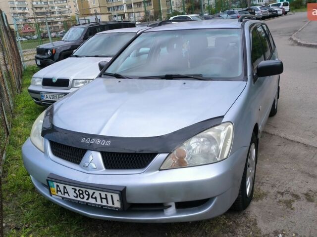 Сірий Міцубісі Lancer, об'ємом двигуна 1.58 л та пробігом 198 тис. км за 3700 $, фото 1 на Automoto.ua
