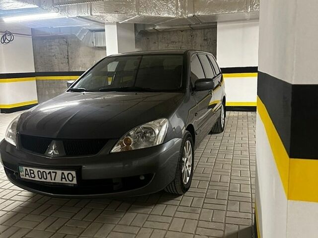 Сірий Міцубісі Lancer, об'ємом двигуна 1.58 л та пробігом 184 тис. км за 4499 $, фото 1 на Automoto.ua