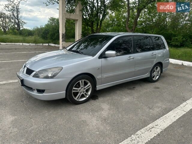 Сірий Міцубісі Lancer, об'ємом двигуна 1.6 л та пробігом 350 тис. км за 4000 $, фото 1 на Automoto.ua