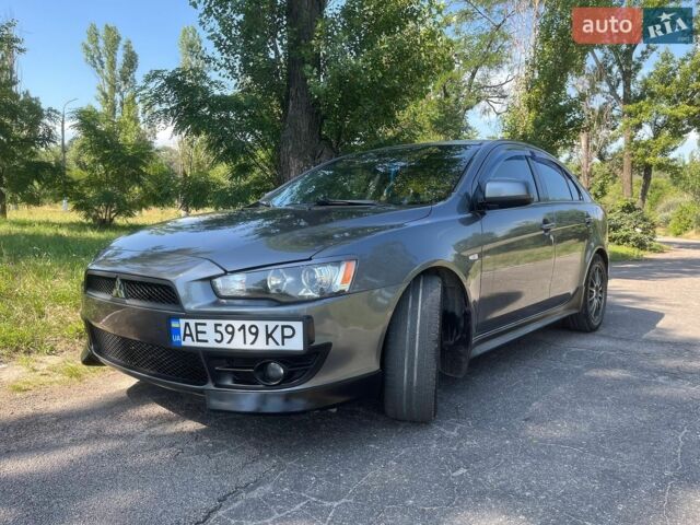 Серый Мицубиси Лансер, объемом двигателя 1.8 л и пробегом 195 тыс. км за 7000 $, фото 1 на Automoto.ua