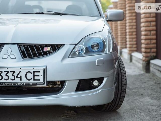 Сірий Міцубісі Lancer, об'ємом двигуна 1.6 л та пробігом 81 тис. км за 8200 $, фото 1 на Automoto.ua