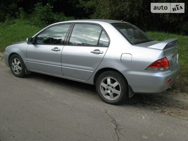 Сірий Міцубісі Lancer, об'ємом двигуна 1.6 л та пробігом 245 тис. км за 5200 $, фото 1 на Automoto.ua