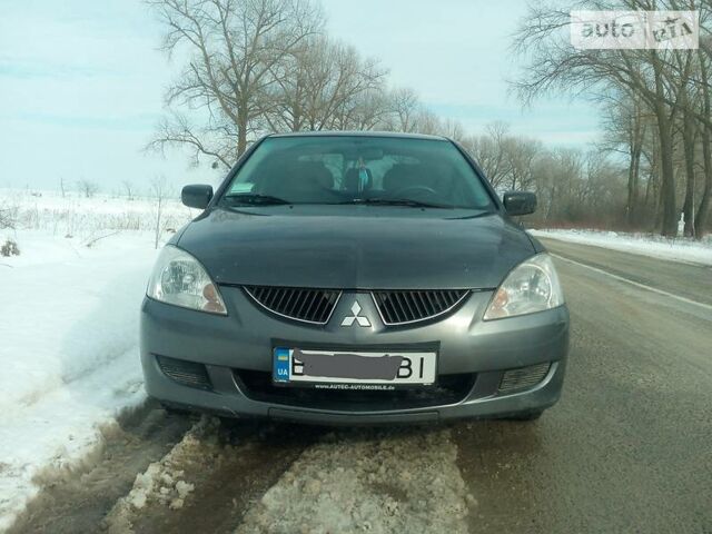 Сірий Міцубісі Lancer, об'ємом двигуна 1.6 л та пробігом 230 тис. км за 5350 $, фото 1 на Automoto.ua