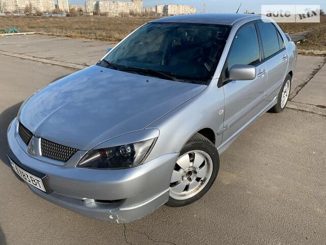 Сірий Міцубісі Lancer, об'ємом двигуна 2 л та пробігом 231 тис. км за 4500 $, фото 1 на Automoto.ua