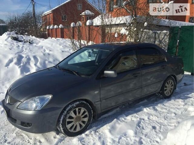 Сірий Міцубісі Lancer, об'ємом двигуна 1.6 л та пробігом 160 тис. км за 6300 $, фото 1 на Automoto.ua