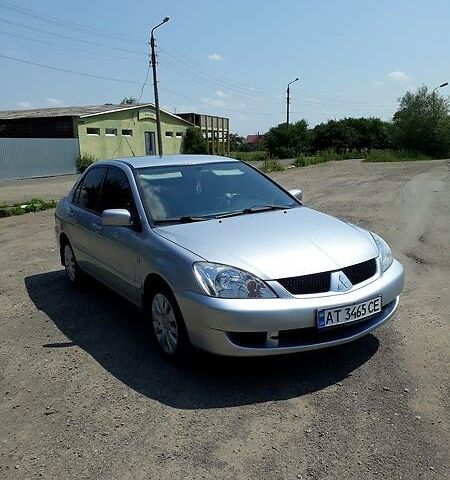 Сірий Міцубісі Lancer, об'ємом двигуна 1.6 л та пробігом 182 тис. км за 6350 $, фото 1 на Automoto.ua