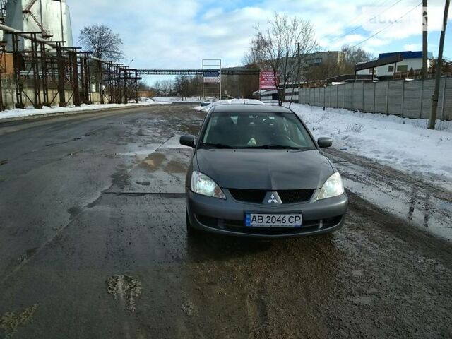 Сірий Міцубісі Lancer, об'ємом двигуна 1.6 л та пробігом 180 тис. км за 6600 $, фото 1 на Automoto.ua