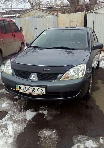 Сірий Міцубісі Lancer, об'ємом двигуна 1.6 л та пробігом 127 тис. км за 7200 $, фото 1 на Automoto.ua