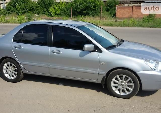 Сірий Міцубісі Lancer, об'ємом двигуна 1.6 л та пробігом 149 тис. км за 6500 $, фото 1 на Automoto.ua