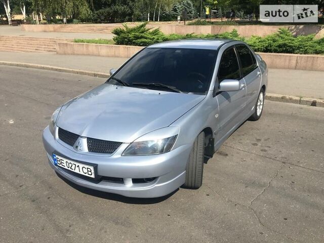 Сірий Міцубісі Lancer, об'ємом двигуна 2 л та пробігом 143 тис. км за 7300 $, фото 1 на Automoto.ua