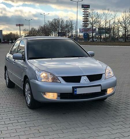 Сірий Міцубісі Lancer, об'ємом двигуна 0 л та пробігом 104 тис. км за 7700 $, фото 1 на Automoto.ua