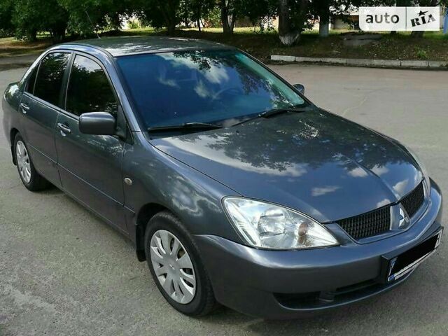 Сірий Міцубісі Lancer, об'ємом двигуна 1.6 л та пробігом 132 тис. км за 6400 $, фото 1 на Automoto.ua