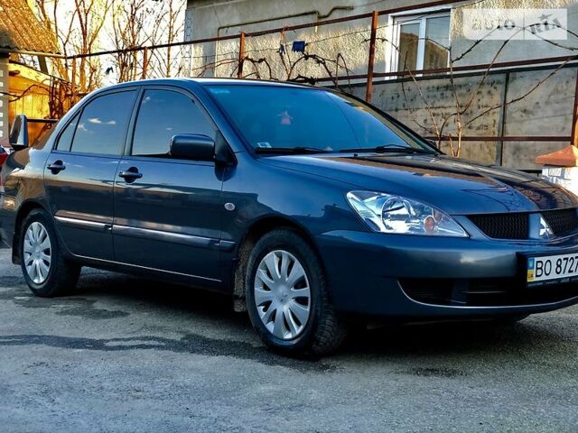 Сірий Міцубісі Lancer, об'ємом двигуна 0 л та пробігом 141 тис. км за 7100 $, фото 1 на Automoto.ua