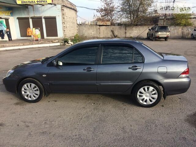 Сірий Міцубісі Lancer, об'ємом двигуна 0 л та пробігом 72 тис. км за 7500 $, фото 1 на Automoto.ua