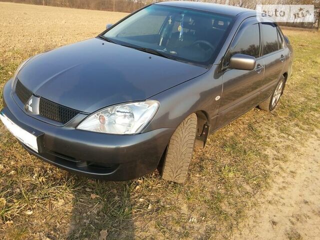 Сірий Міцубісі Lancer, об'ємом двигуна 1.6 л та пробігом 103 тис. км за 5800 $, фото 1 на Automoto.ua