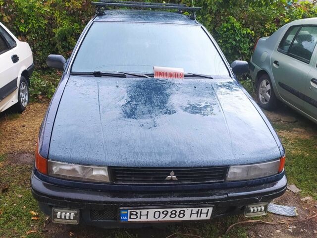 Синий Мицубиси Лансер, объемом двигателя 1.8 л и пробегом 263 тыс. км за 1600 $, фото 1 на Automoto.ua