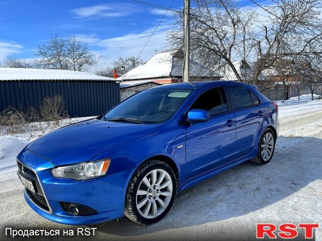 Синій Міцубісі Lancer, об'ємом двигуна 2 л та пробігом 215 тис. км за 11000 $, фото 1 на Automoto.ua