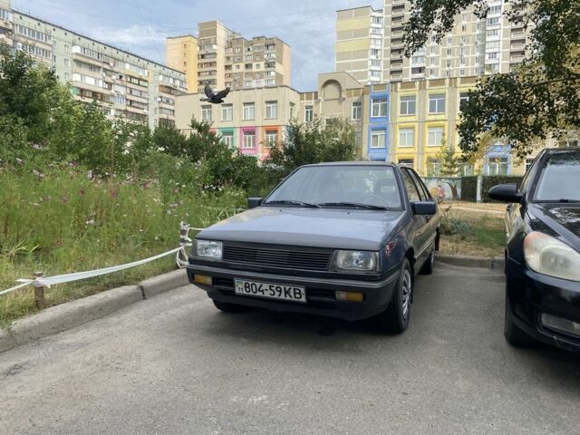 Синій Міцубісі Lancer, об'ємом двигуна 0.15 л та пробігом 252 тис. км за 800 $, фото 1 на Automoto.ua