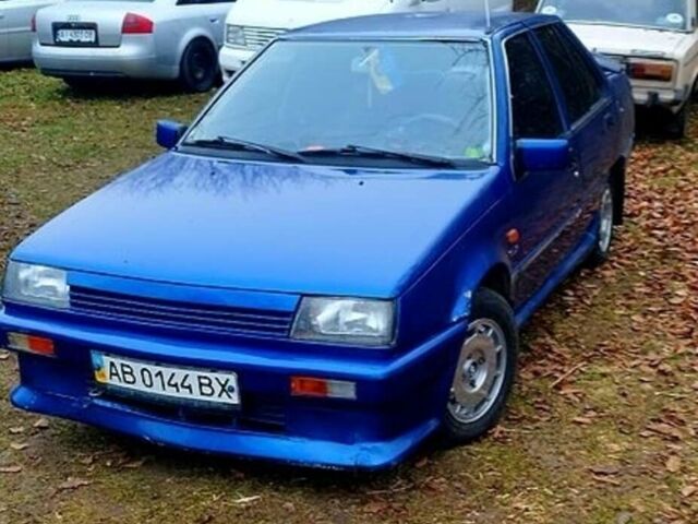 Синій Міцубісі Lancer, об'ємом двигуна 1.5 л та пробігом 320 тис. км за 1250 $, фото 1 на Automoto.ua
