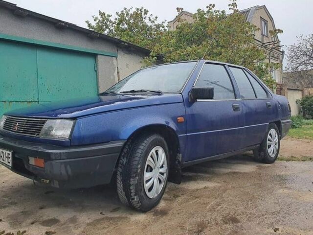 Синий Мицубиси Лансер, объемом двигателя 0 л и пробегом 322 тыс. км за 750 $, фото 1 на Automoto.ua