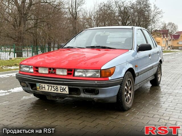 Синий Мицубиси Лансер, объемом двигателя 1.5 л и пробегом 450 тыс. км за 1400 $, фото 1 на Automoto.ua