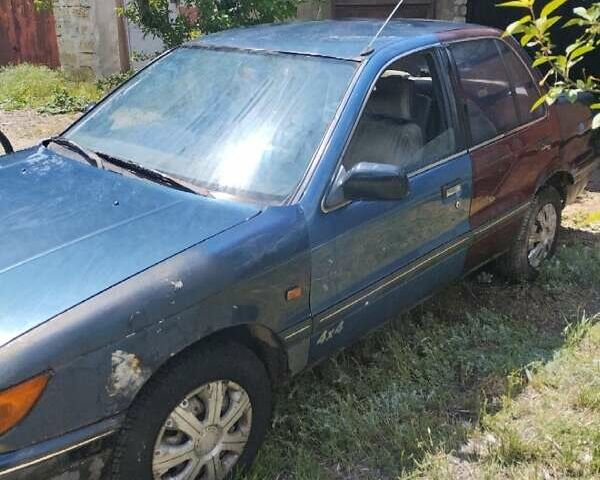 Синій Міцубісі Lancer, об'ємом двигуна 1.3 л та пробігом 100 тис. км за 700 $, фото 1 на Automoto.ua