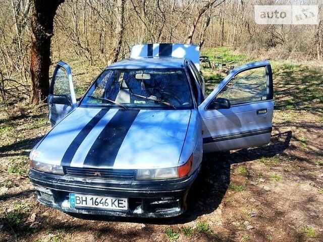 Синій Міцубісі Lancer, об'ємом двигуна 1.5 л та пробігом 134 тис. км за 1200 $, фото 1 на Automoto.ua