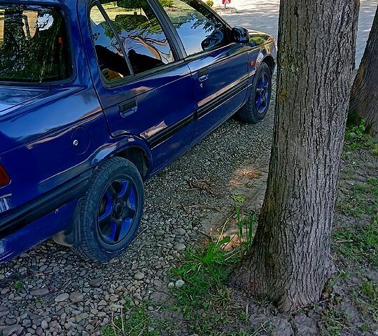 Синій Міцубісі Lancer, об'ємом двигуна 1.3 л та пробігом 400 тис. км за 1600 $, фото 1 на Automoto.ua