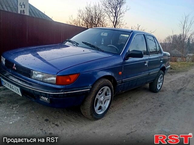 Синий Мицубиси Лансер, объемом двигателя 1.5 л и пробегом 0 тыс. км за 1700 $, фото 1 на Automoto.ua