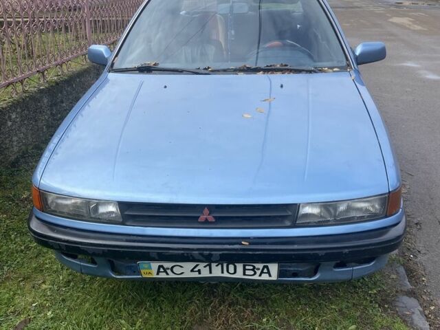 Синій Міцубісі Lancer, об'ємом двигуна 1.5 л та пробігом 330 тис. км за 1200 $, фото 1 на Automoto.ua