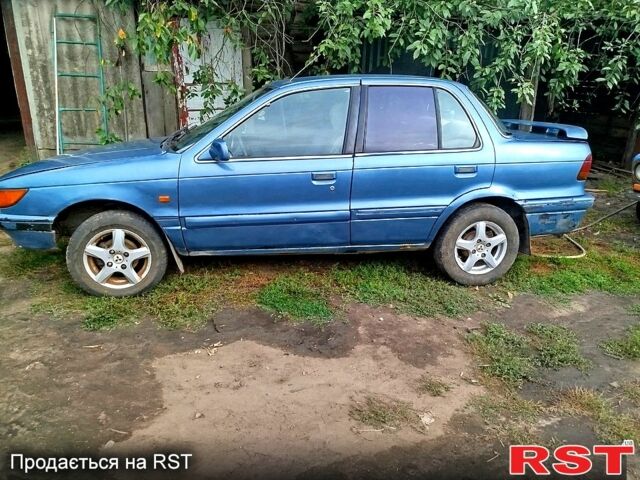 Синій Міцубісі Lancer, об'ємом двигуна 1.5 л та пробігом 111 тис. км за 1000 $, фото 1 на Automoto.ua