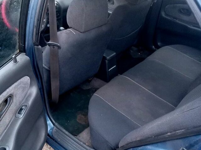 Синий Мицубиси Лансер, объемом двигателя 20 л и пробегом 250 тыс. км за 1500 $, фото 1 на Automoto.ua