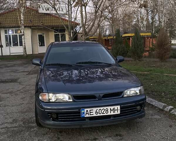 Синий Мицубиси Лансер, объемом двигателя 1.6 л и пробегом 100 тыс. км за 2500 $, фото 1 на Automoto.ua