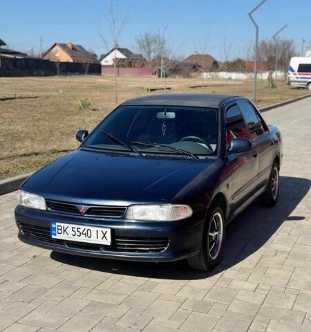 Синий Мицубиси Лансер, объемом двигателя 1.3 л и пробегом 370 тыс. км за 1600 $, фото 1 на Automoto.ua