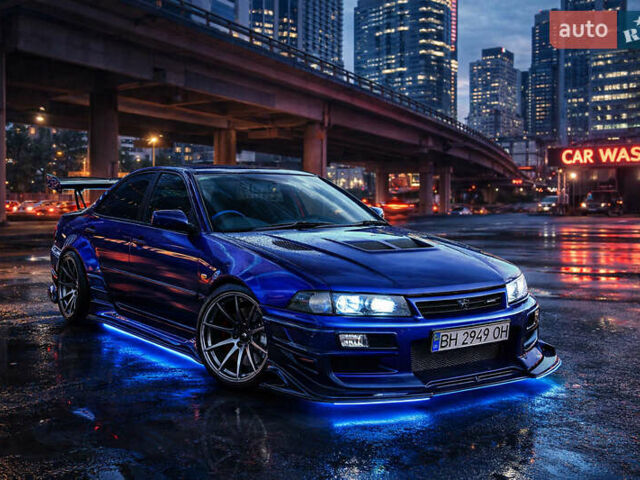 Синий Мицубиси Лансер, объемом двигателя 1.5 л и пробегом 250 тыс. км за 1600 $, фото 1 на Automoto.ua