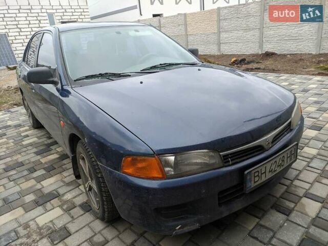 Синій Міцубісі Lancer, об'ємом двигуна 1.3 л та пробігом 250 тис. км за 2100 $, фото 1 на Automoto.ua