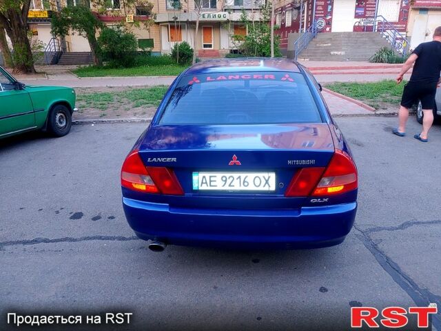 Синій Міцубісі Lancer, об'ємом двигуна 1.3 л та пробігом 270 тис. км за 2100 $, фото 1 на Automoto.ua