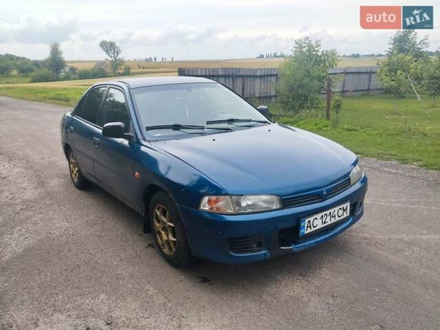 Синій Міцубісі Lancer, об'ємом двигуна 1.3 л та пробігом 300 тис. км за 980 $, фото 1 на Automoto.ua