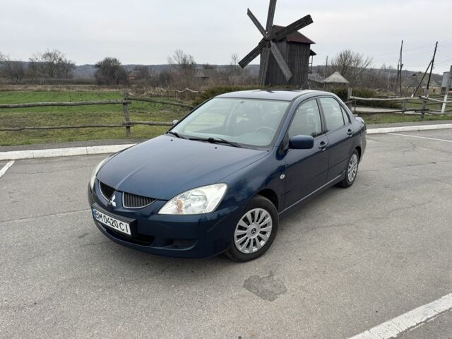 Синий Мицубиси Лансер, объемом двигателя 1.6 л и пробегом 182 тыс. км за 3500 $, фото 1 на Automoto.ua