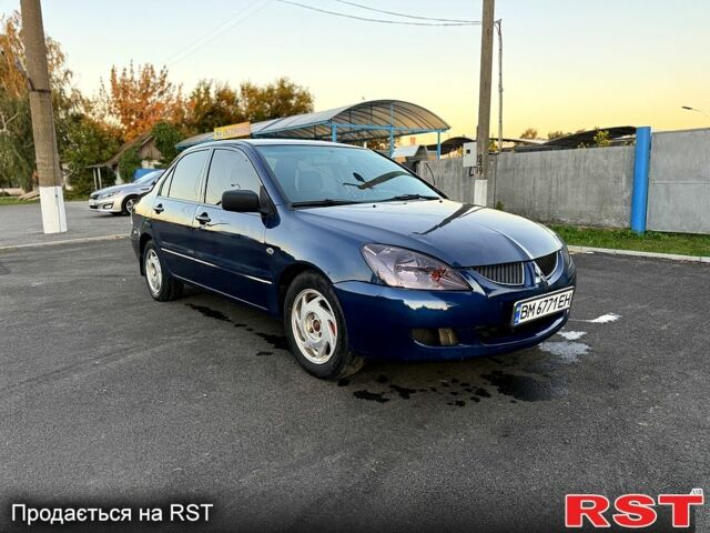 Синій Міцубісі Lancer, об'ємом двигуна 1.6 л та пробігом 150 тис. км за 3250 $, фото 1 на Automoto.ua
