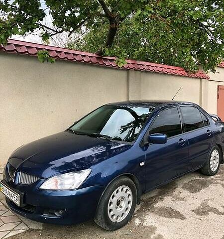 Синій Міцубісі Lancer, об'ємом двигуна 1.6 л та пробігом 230 тис. км за 4000 $, фото 1 на Automoto.ua