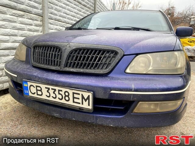 Синій Міцубісі Lancer, об'ємом двигуна 1.8 л та пробігом 150 тис. км за 2000 $, фото 1 на Automoto.ua