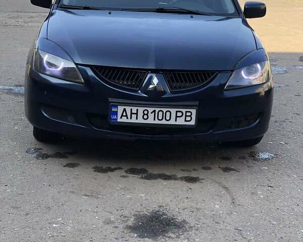 Синій Міцубісі Lancer, об'ємом двигуна 1.58 л та пробігом 255 тис. км за 4100 $, фото 1 на Automoto.ua