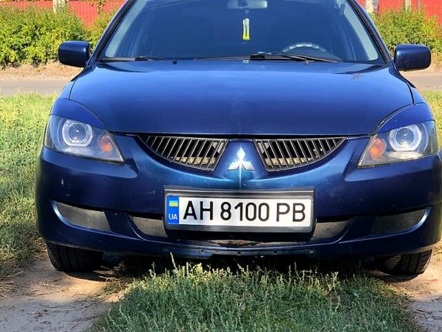 Синий Мицубиси Лансер, объемом двигателя 1.6 л и пробегом 254 тыс. км за 4100 $, фото 1 на Automoto.ua